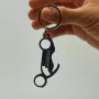 Key ring bottle opener by Motocenter Company